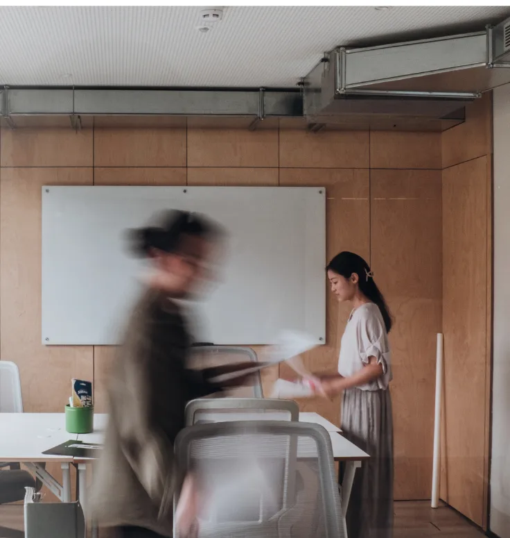 A small business team working together in a bright office